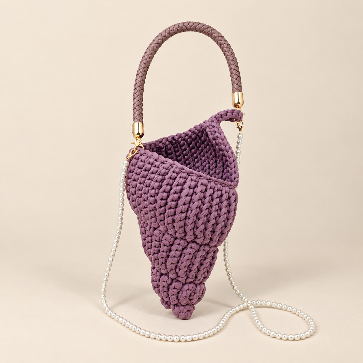 Handmade crochet conch shell bag — close-up of shell-shaped crochet