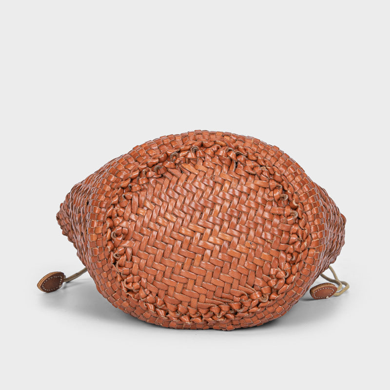 Open-Weave Cowhide Bucket Bag — close-up of open weave leather