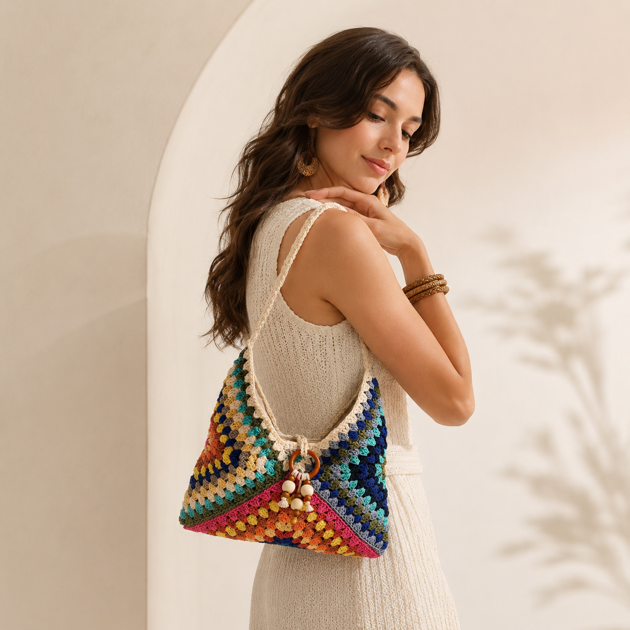 Colorful granny stitch crochet beach bag — model carrying shot