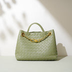 Woven cowhide braided chain tote bag — front view